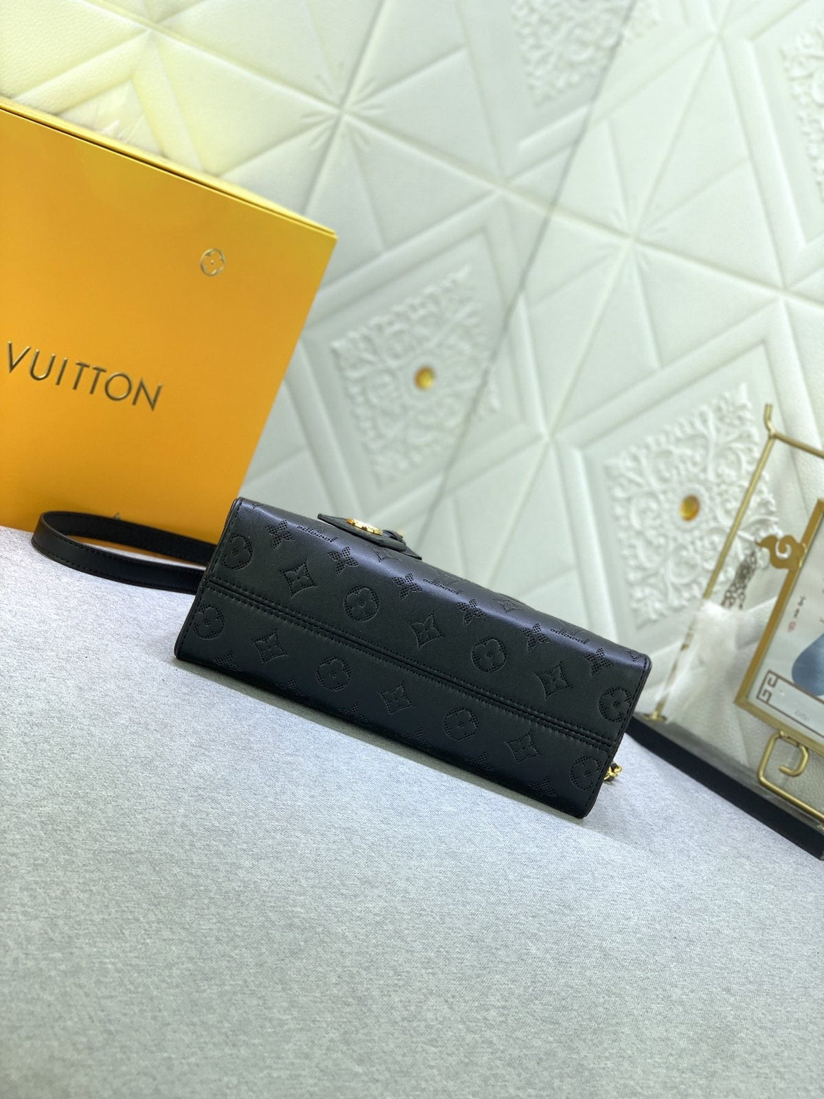 Louis Vuitton OnTheGo East West Embossed Leather Handbag — detail