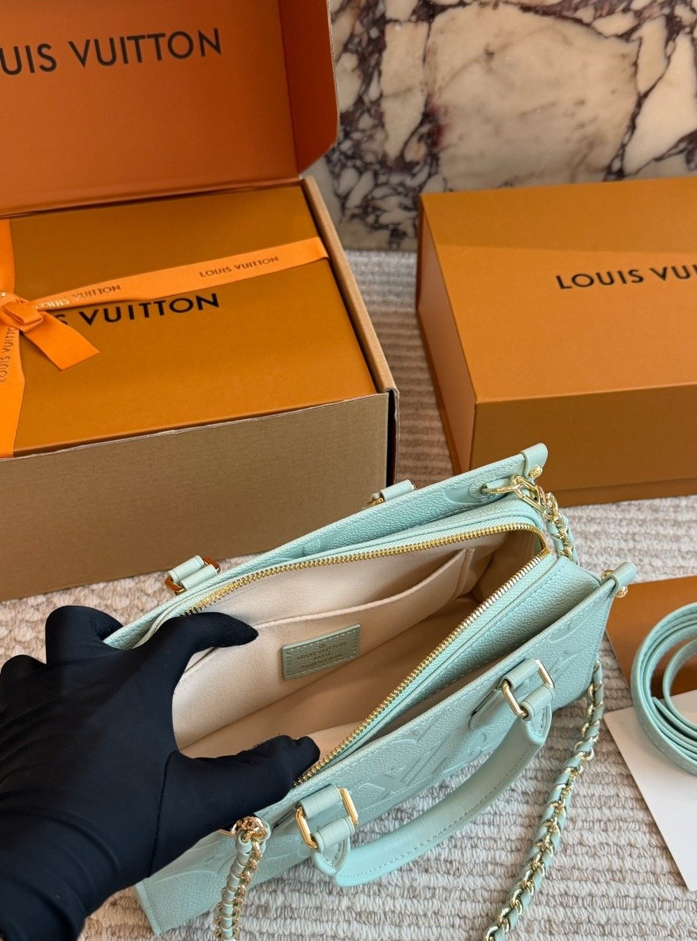 Louis Vuitton Onthego Mint Green Embossed Handbag — detail