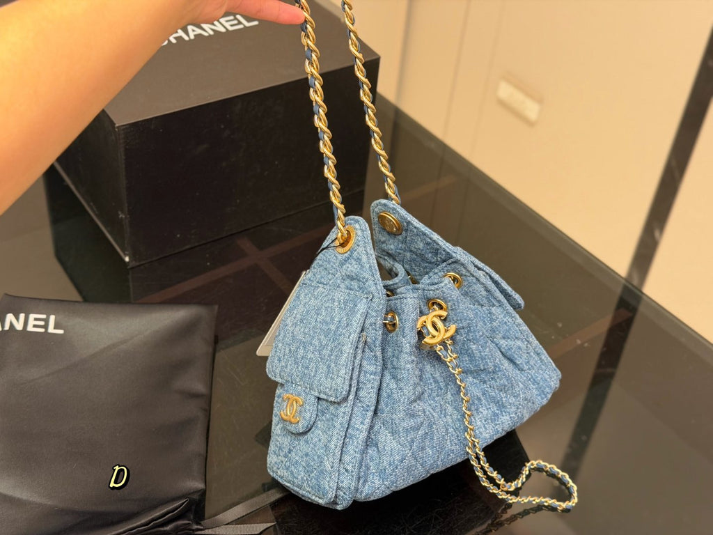 Chanel 25 Blue Quilted Hobo Bag — model