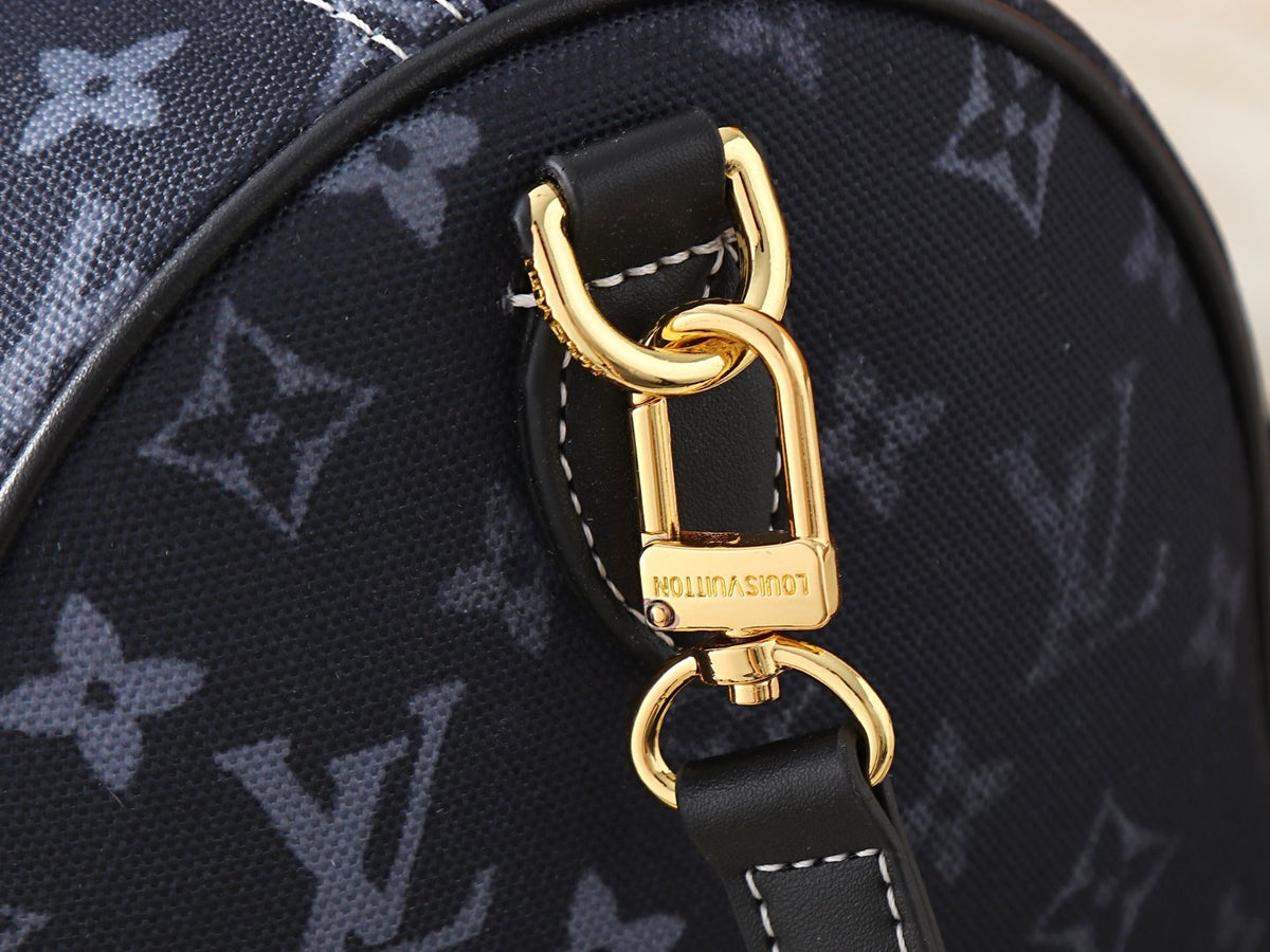 Louis Vuitton Speedy Soft Monogram Emblème Handbag — detail
