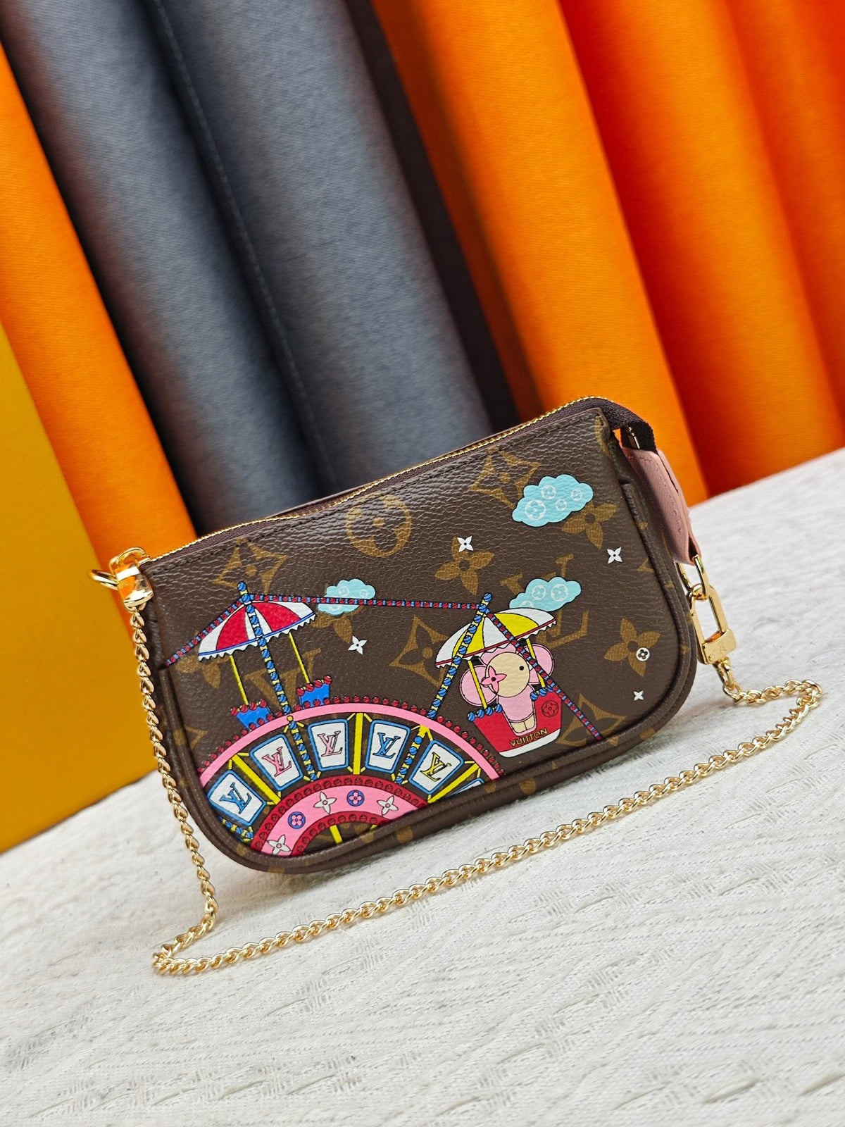 Louis Vuitton Illustrated Monogram Chain Pouch — hero