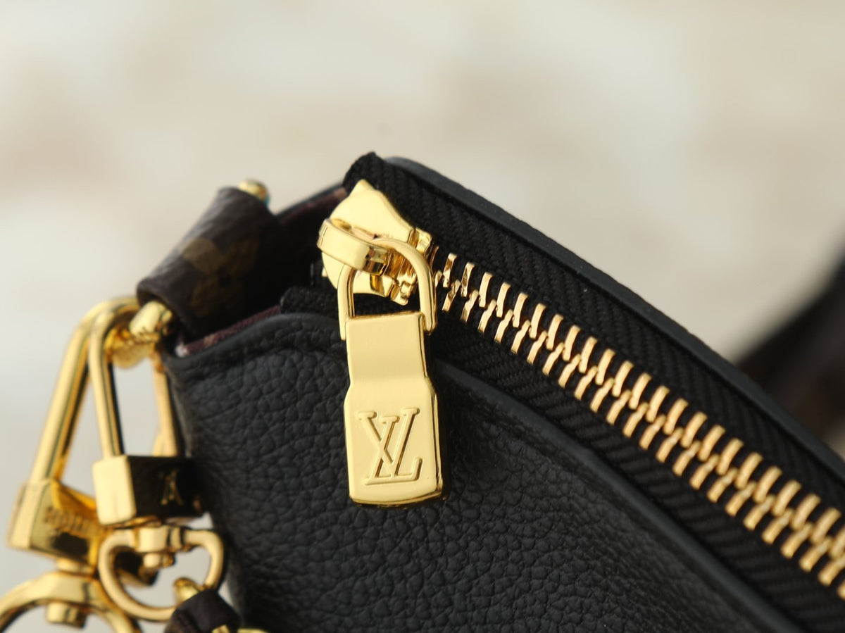 Louis Vuitton Multipass Black Monogram-Accent Handbag — detail