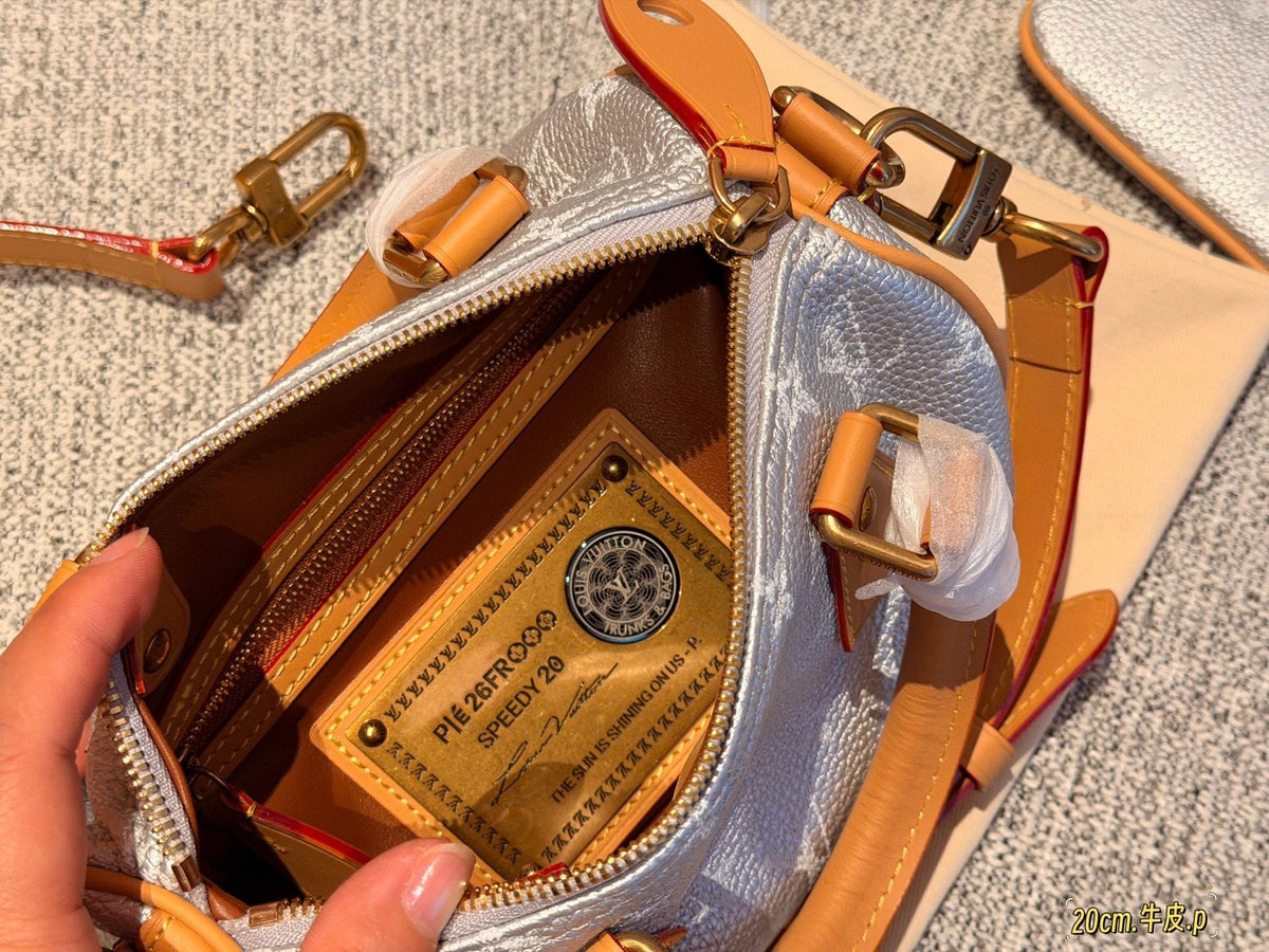 Louis Vuitton Speedy Rolled-Handle Satchel — front