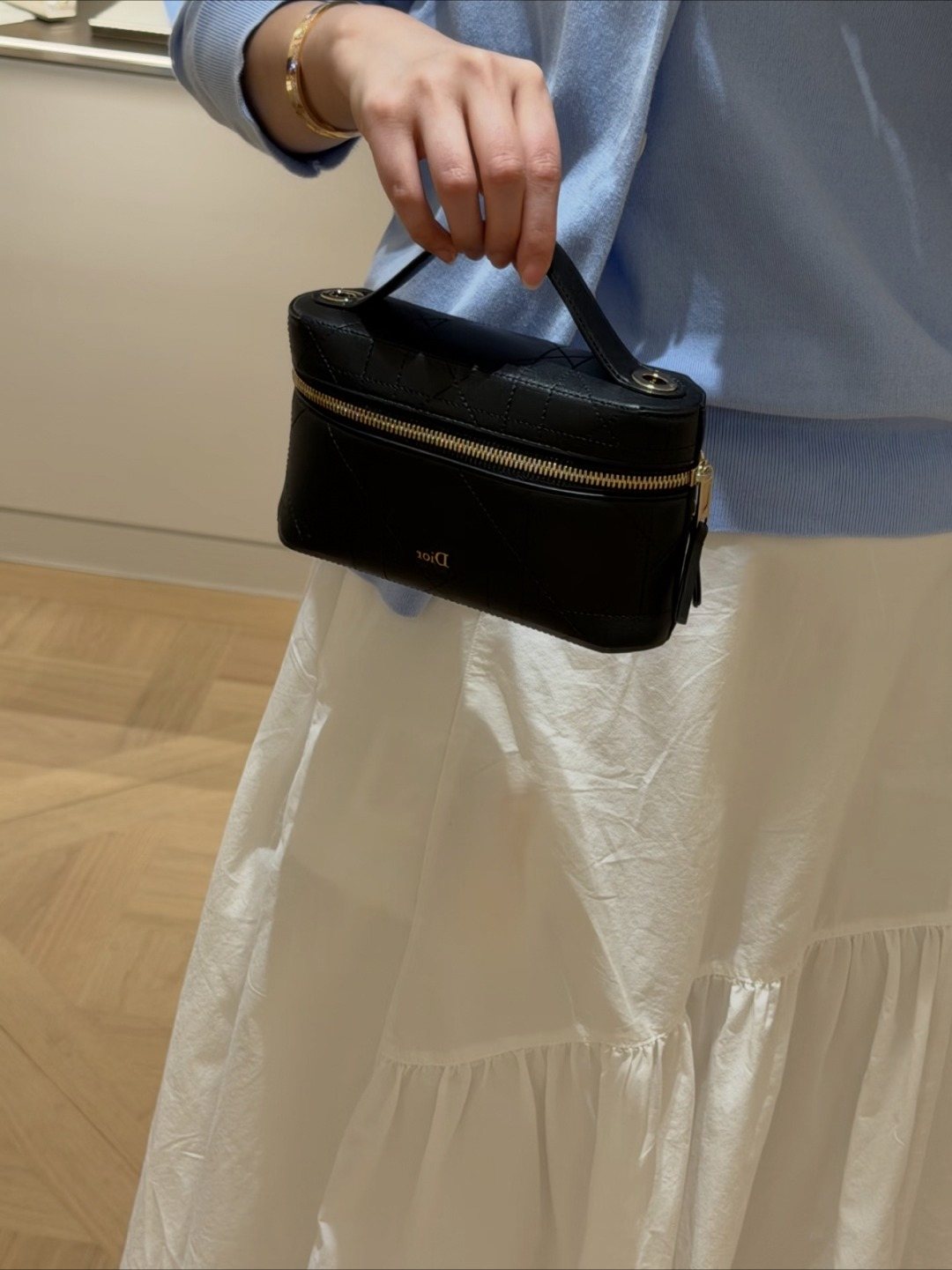 Dior Quilted Top-Handle Box Bag — model