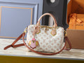 Louis Vuitton Crafty Speedy Bandoulière Monogram Bag — hero