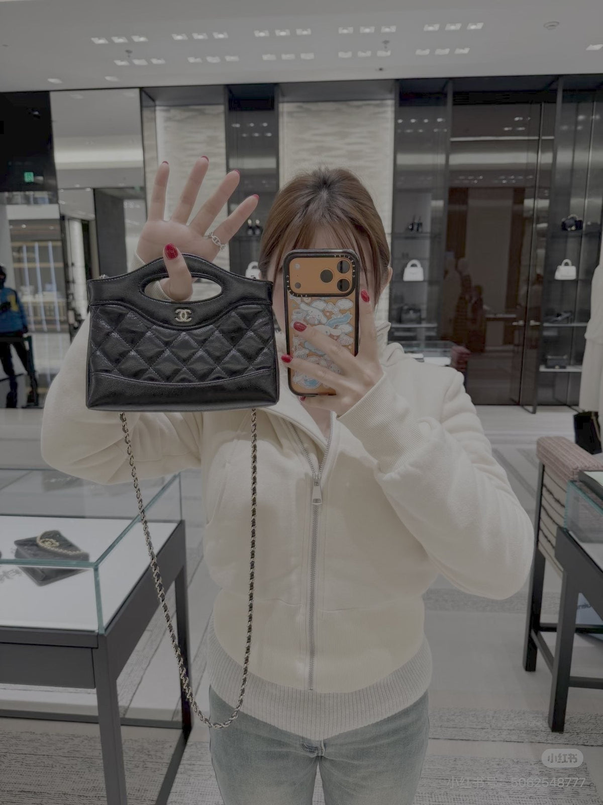 Chanel 31 Bag Quilted Cutout-Handle Handbag — model