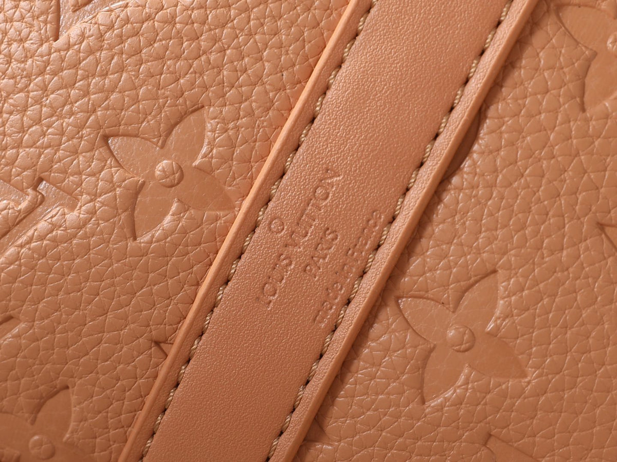 Louis Vuitton Speedy Soft Monogram Empreinte Handbag — detail