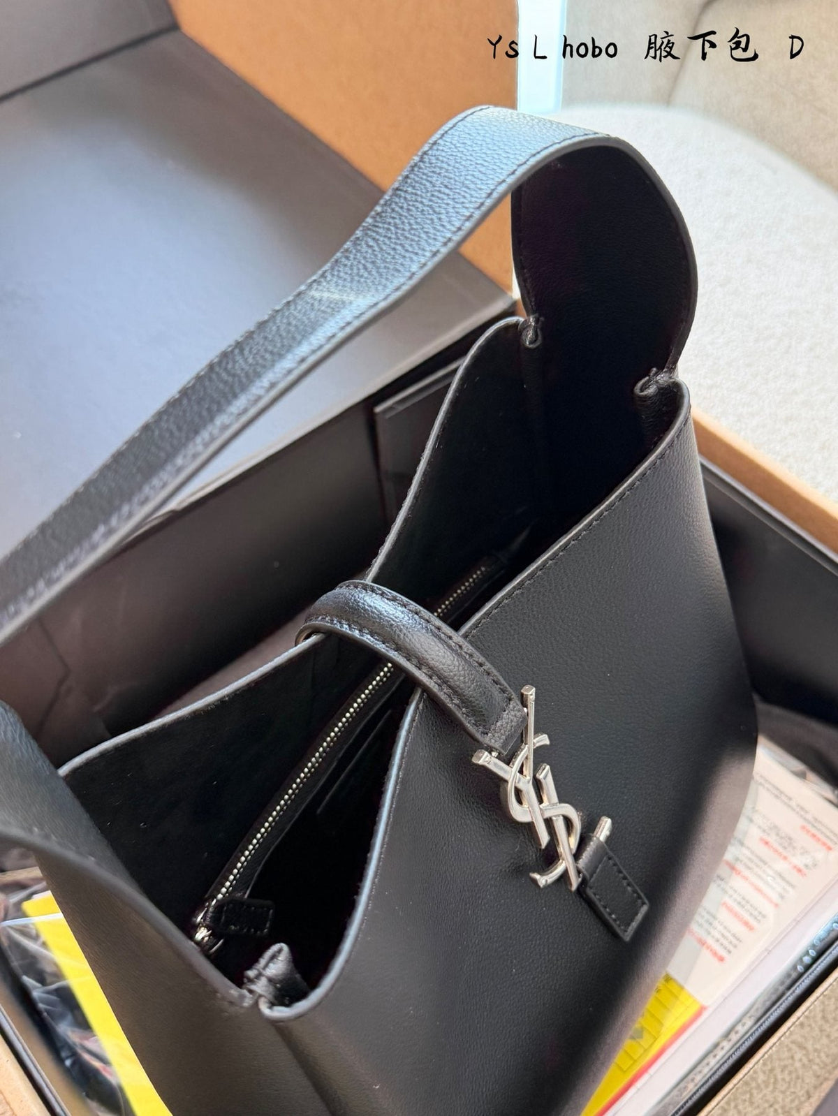 Saint Laurent Black Curved Hobo Shoulder Bag — detail