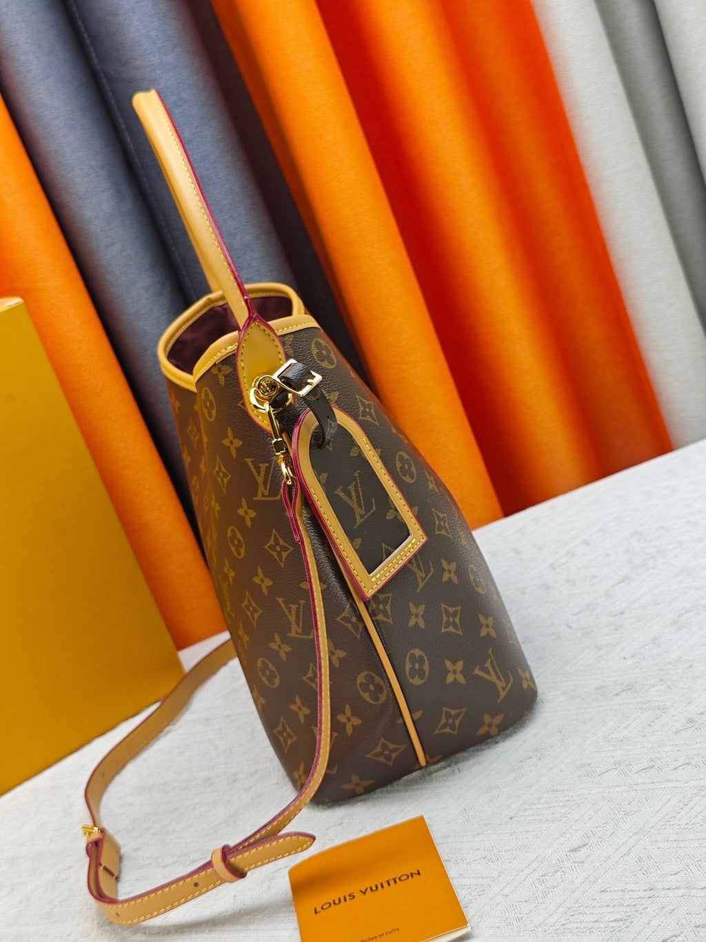 Louis Vuitton Graceful Curved-Top Hobo Bag — side