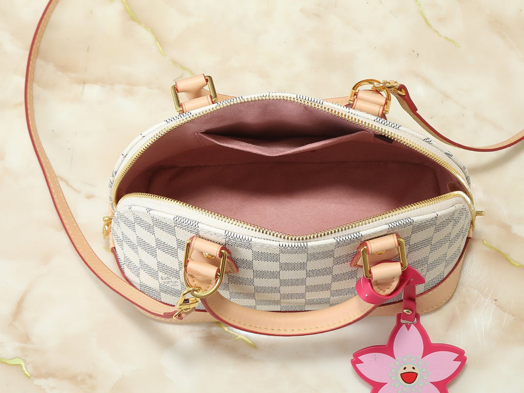 Louis Vuitton Alma Structured Top-Handle Bag — detail
