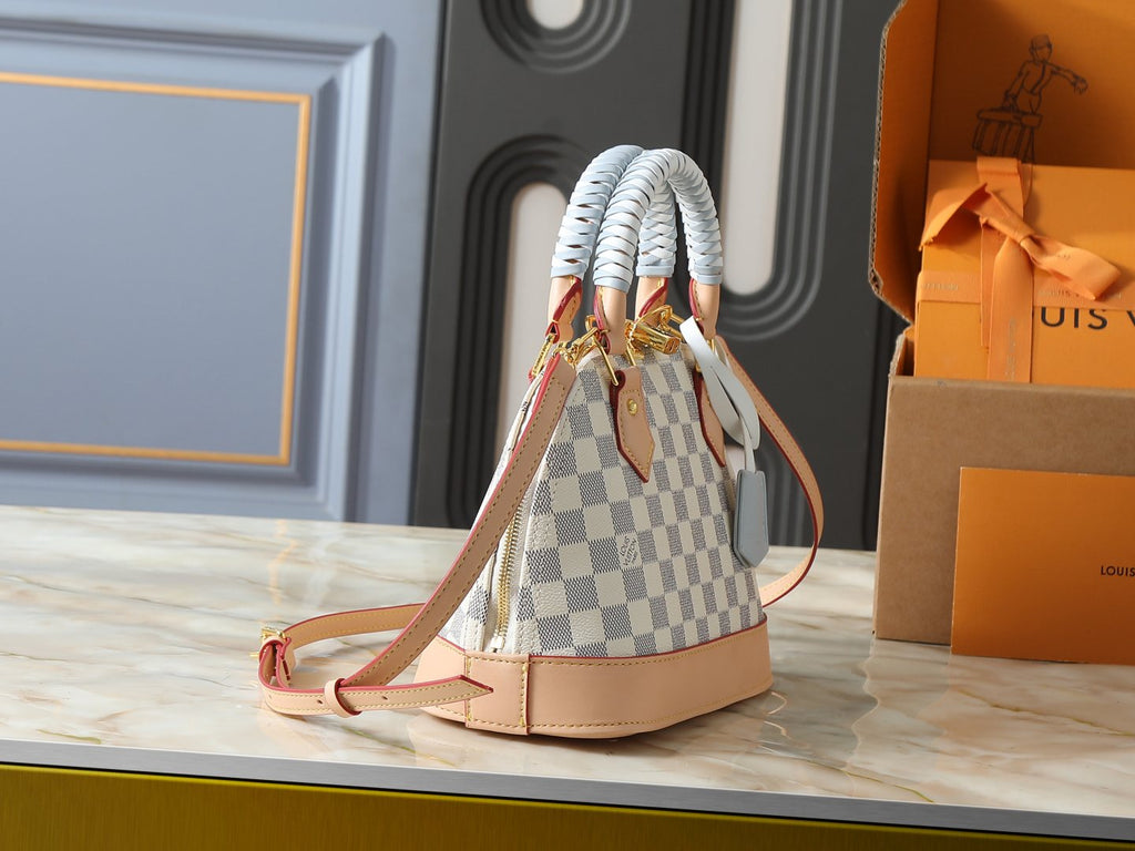 Louis Vuitton Alma Structured Top-Handle Bag — side