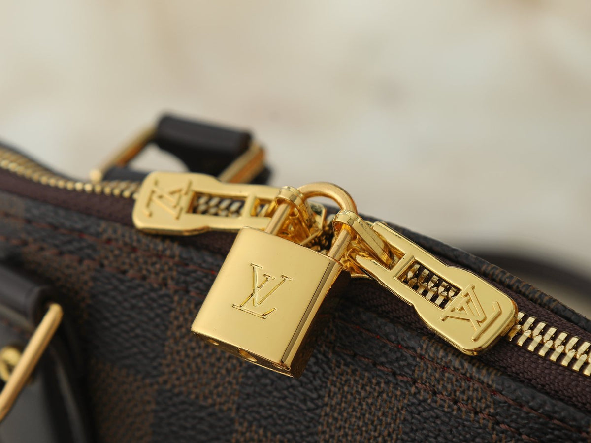 Louis Vuitton Alma Structured Top-Handle Bag — detail