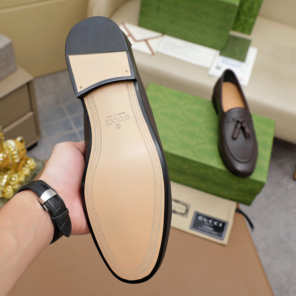 Gucci Textured Tassel Loafers — side