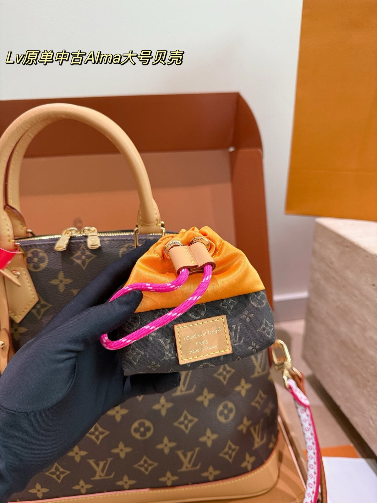 Louis Vuitton Alma Monogram Handbag with Pink Strap — detail