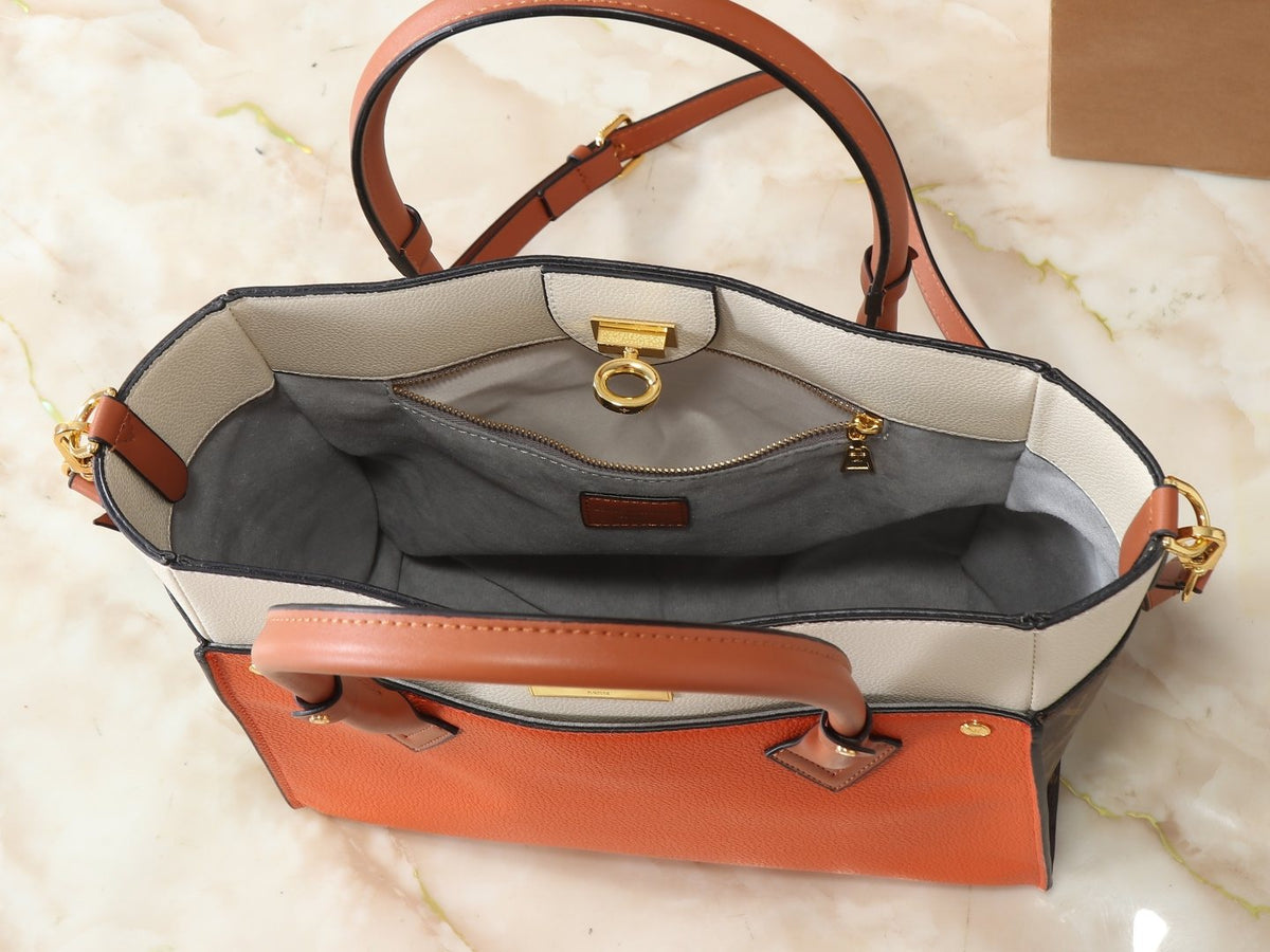 Louis Vuitton On My Side Turnlock Tote — detail