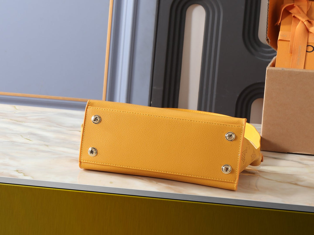 Louis Vuitton On My Side Turnlock Tote — detail