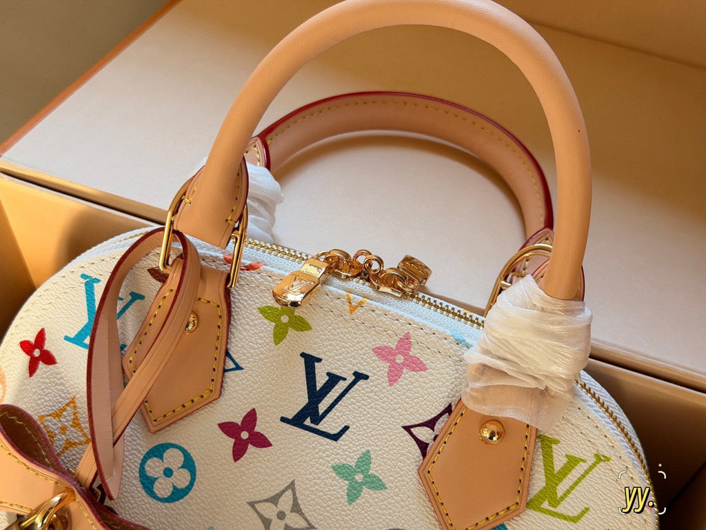 Louis Vuitton Alma BB Monogram Top-Handle Bag — detail