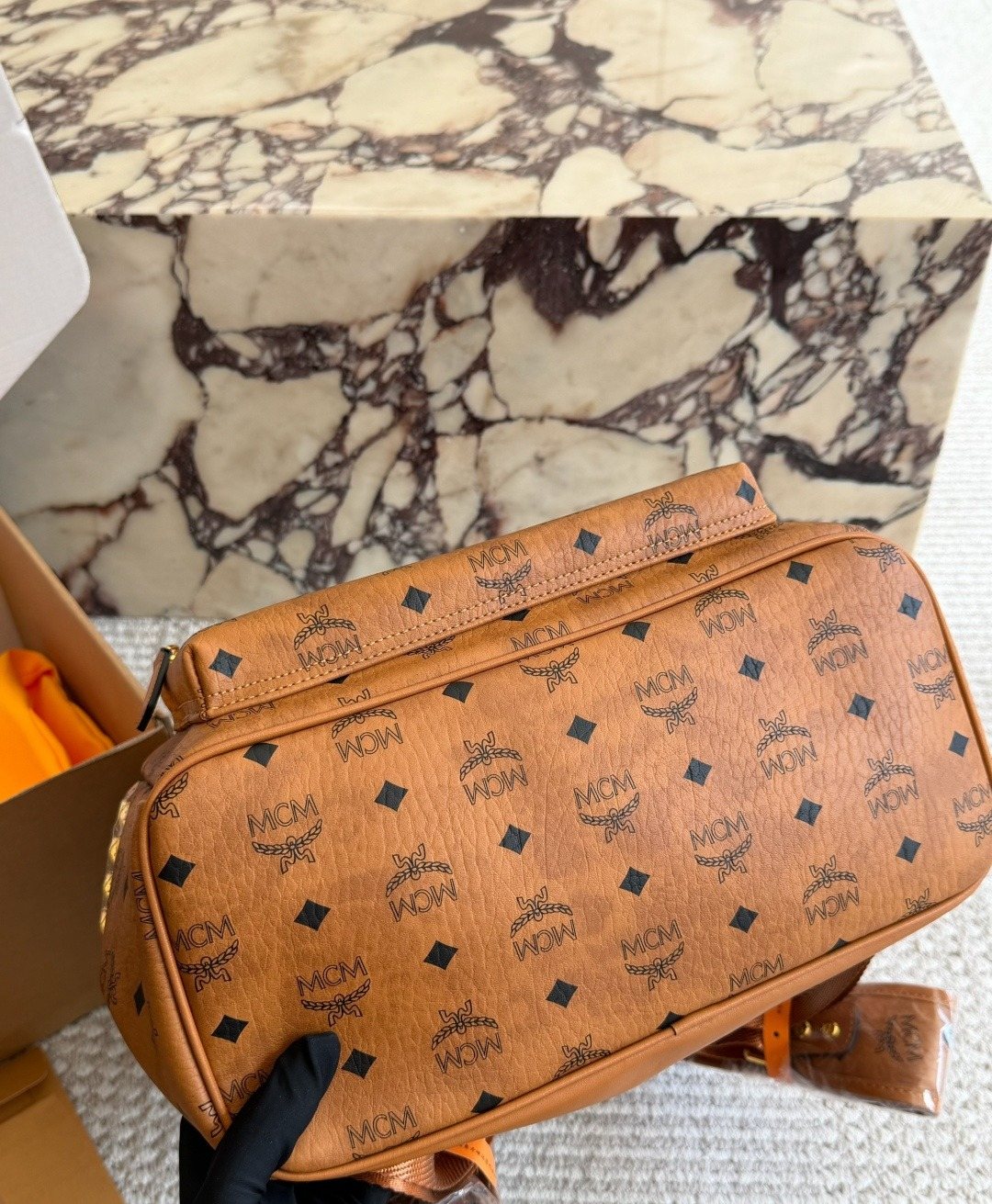 MCM Studded Monogram Backpack — detail