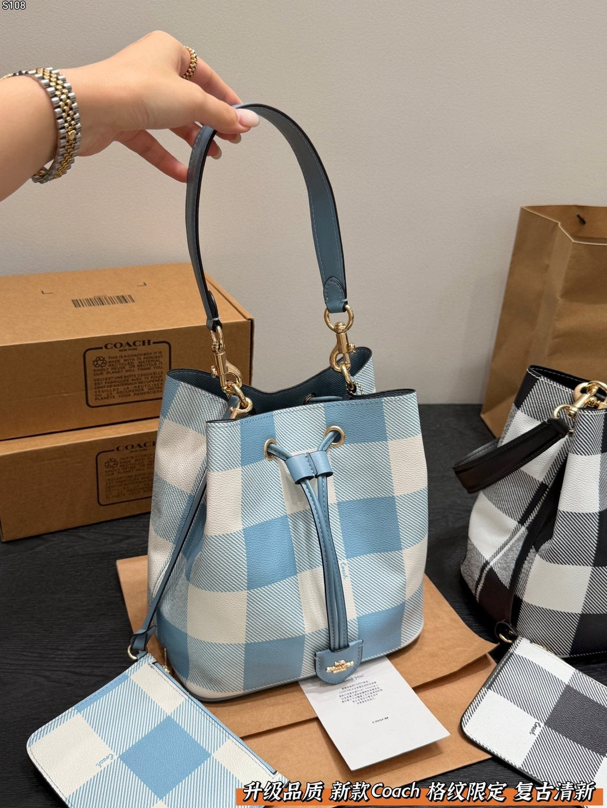 Coach Rowan Check Drawstring Bucket Bag — model