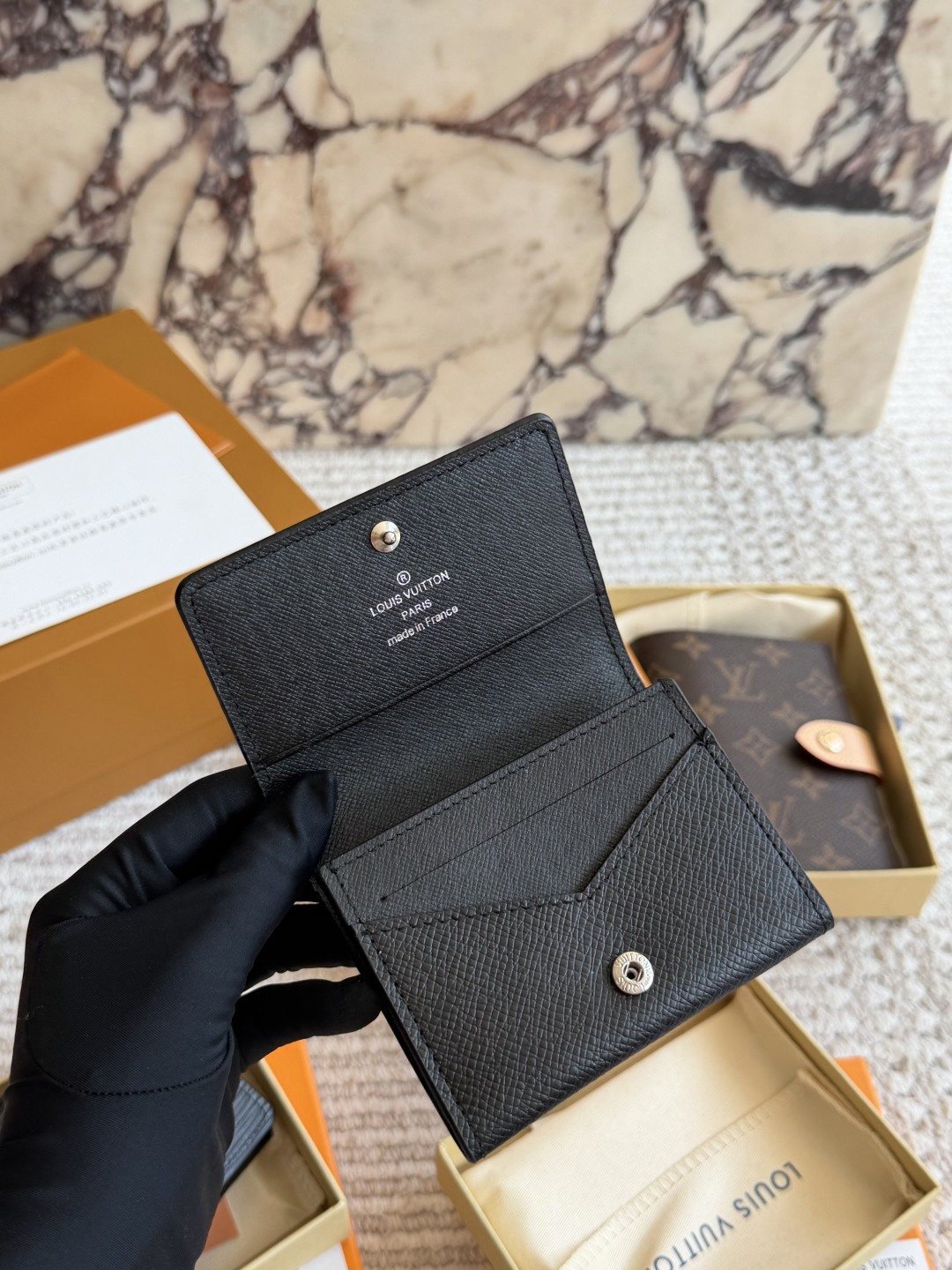 Louis Vuitton Textured Black Folding Card Holder — front