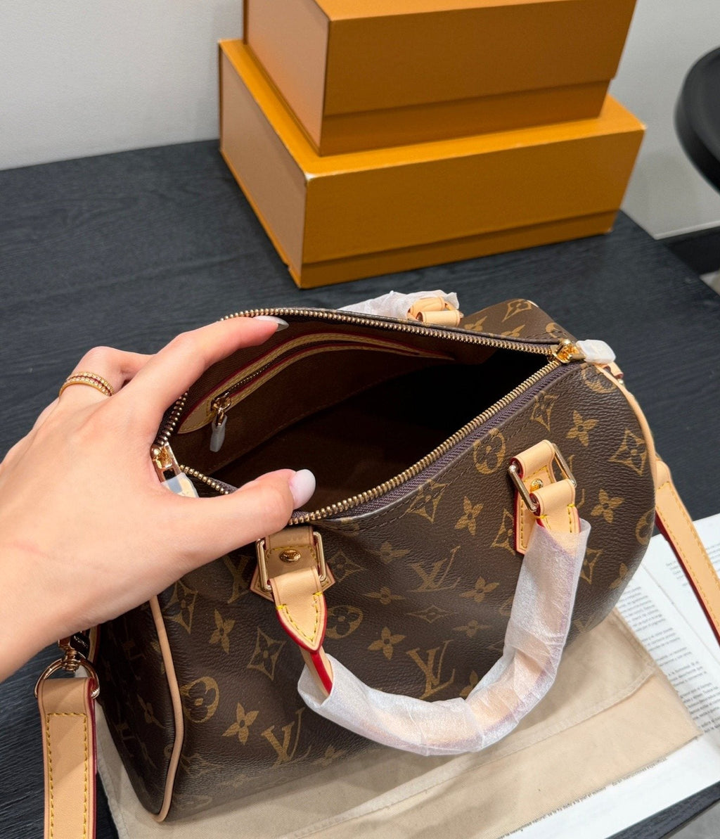 Louis Vuitton Speedy Monogram Barrel Handbag — detail