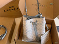 Coach Rowan Pastel Signature Drawstring Bucket Bag — hero