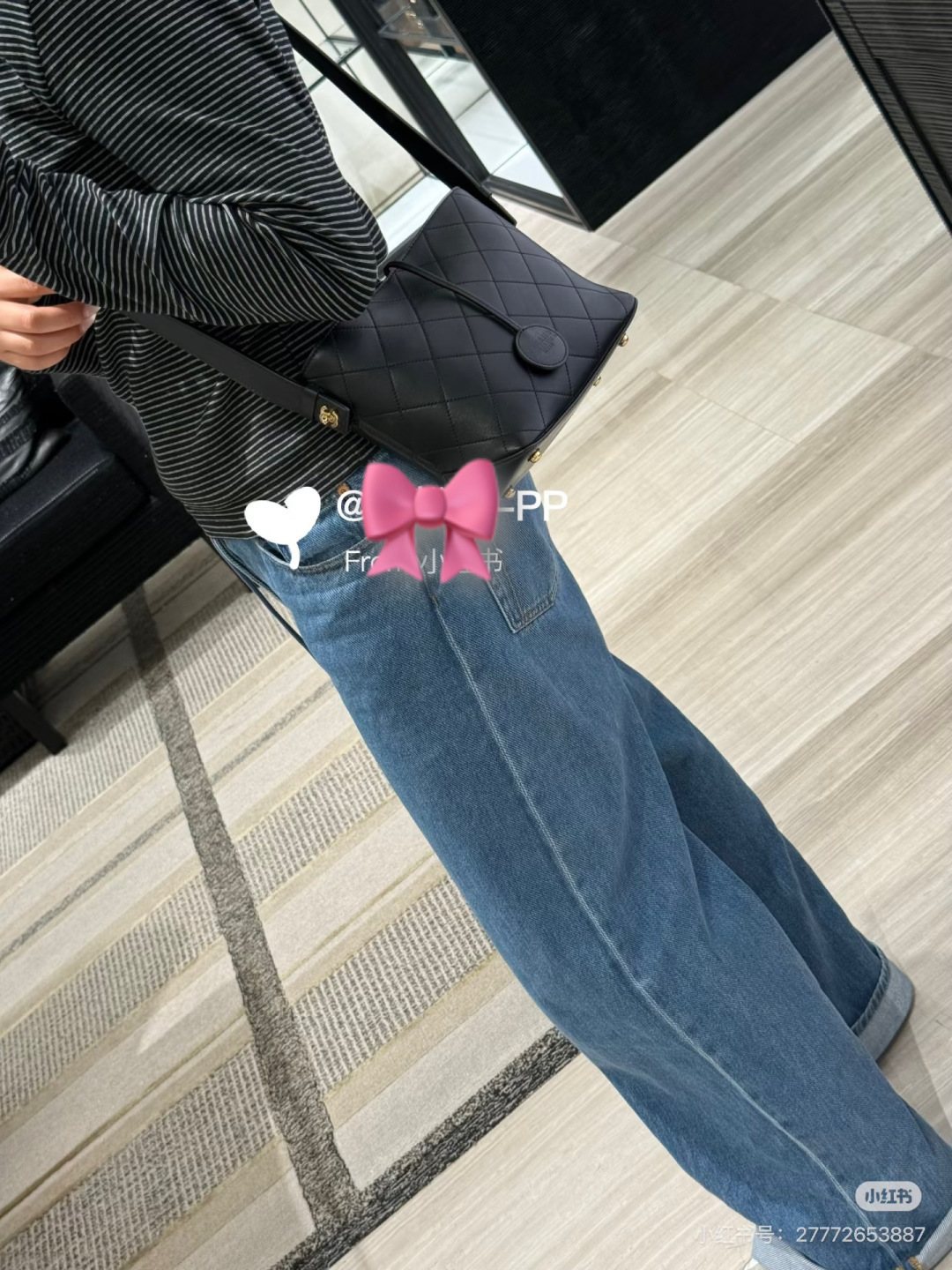 Chanel Diamond-Quilted Pendant Bucket Bag — model