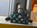Louis Vuitton Keepall Bandoulière Duffel Bag — front