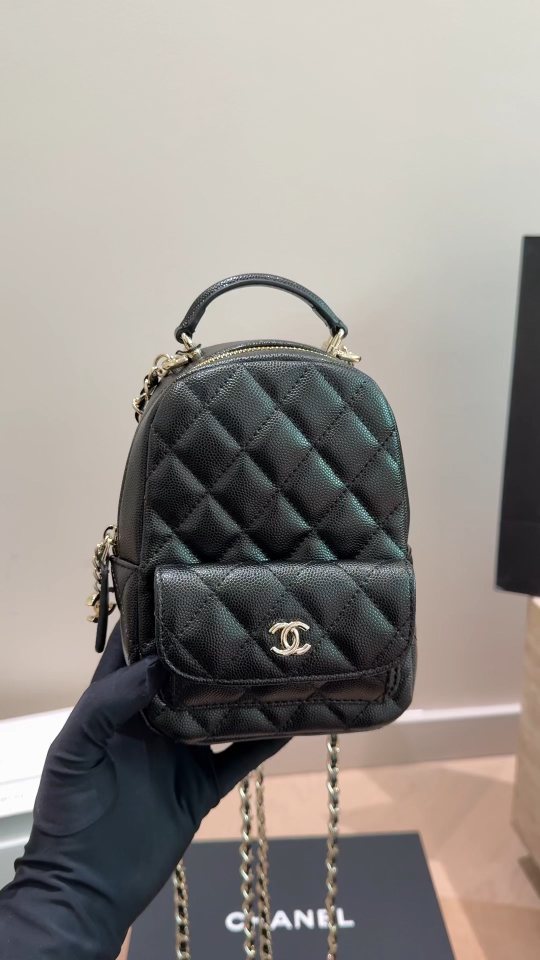 Chanel Quilted Top-Handle Backpack — hero