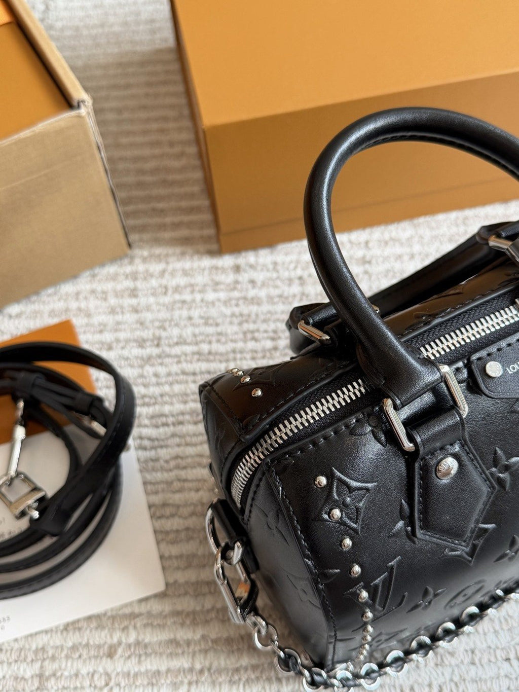 Louis Vuitton Nano Speedy Black Embossed Monogram Bag — detail