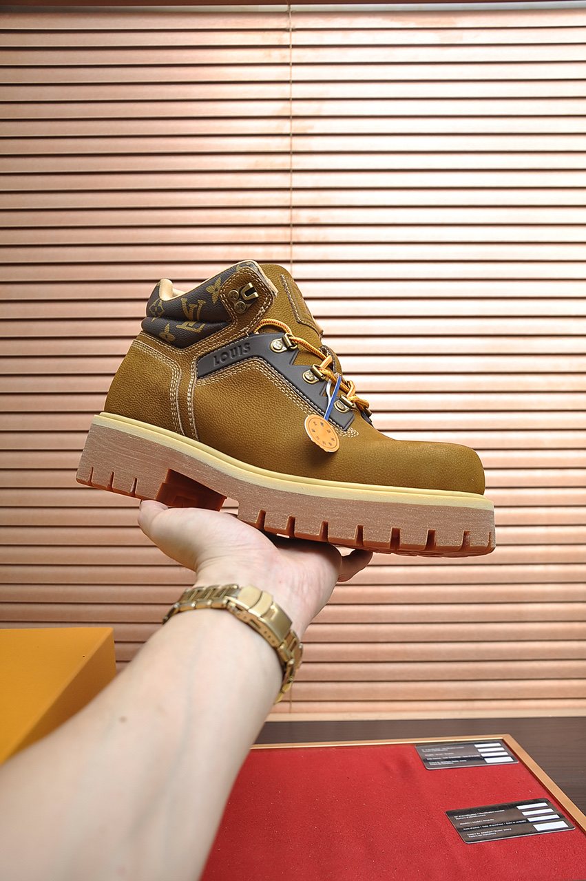 Louis Vuitton Lace-Up Lug-Sole High-Top Boots — model