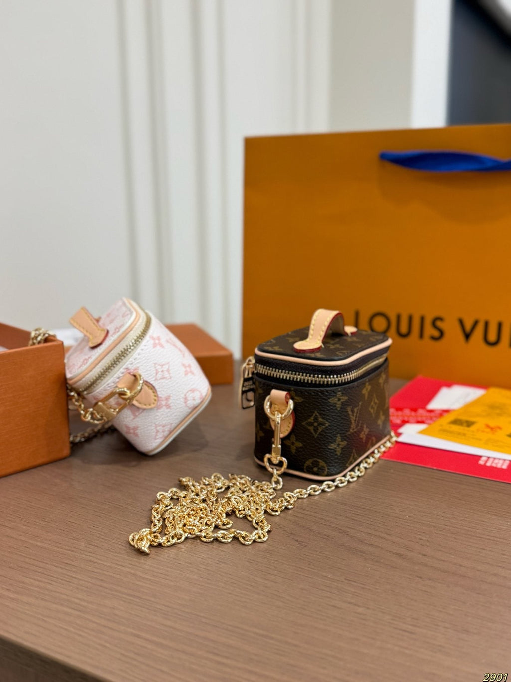 Louis Vuitton Monogram Box Coin Purse with Chain Strap — comparison