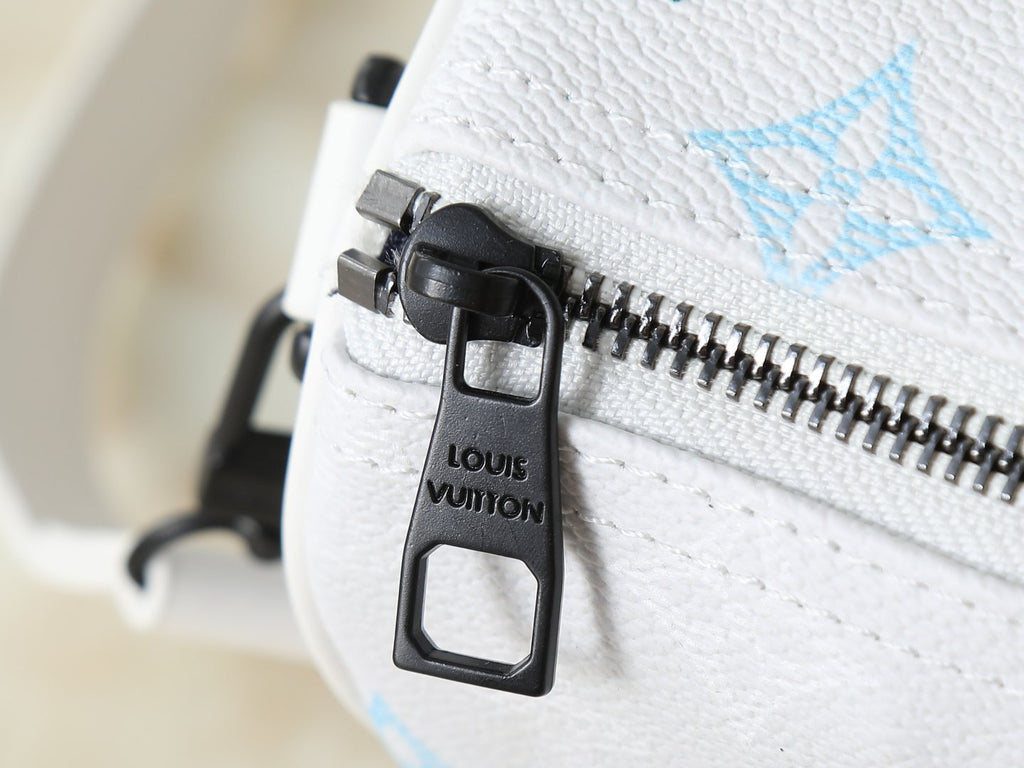 Louis Vuitton Keepall Bandoulière White Monogram Mini Duffel — detail