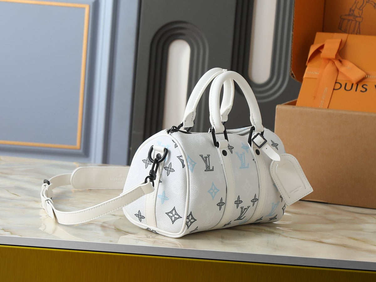 Louis Vuitton Keepall Bandoulière White Monogram Mini Duffel — side