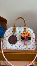 Louis Vuitton Alma White Multicolored Monogram Handbag — hero