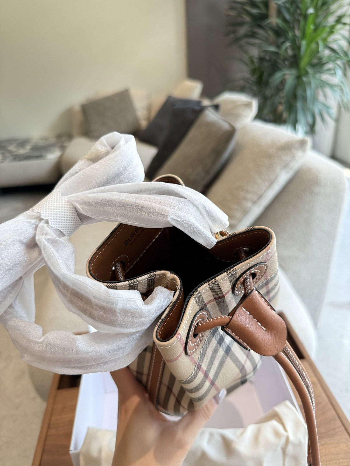 Beige Check Drawstring Bucket Bag with Tan Trim — front