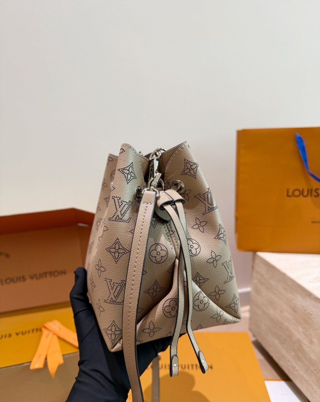 Louis Vuitton Bella Monogram Bucket Bag — side