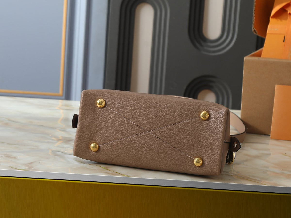 Louis Vuitton Neo Alma Empreinte Top-Handle Bag — detail