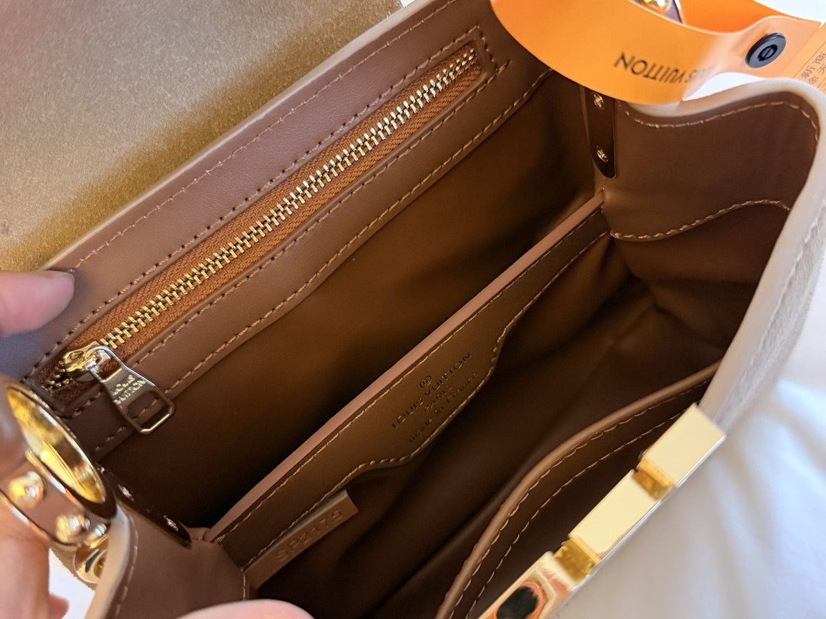 Louis Vuitton Capucines Suede-Textured Top-Handle Bag — detail