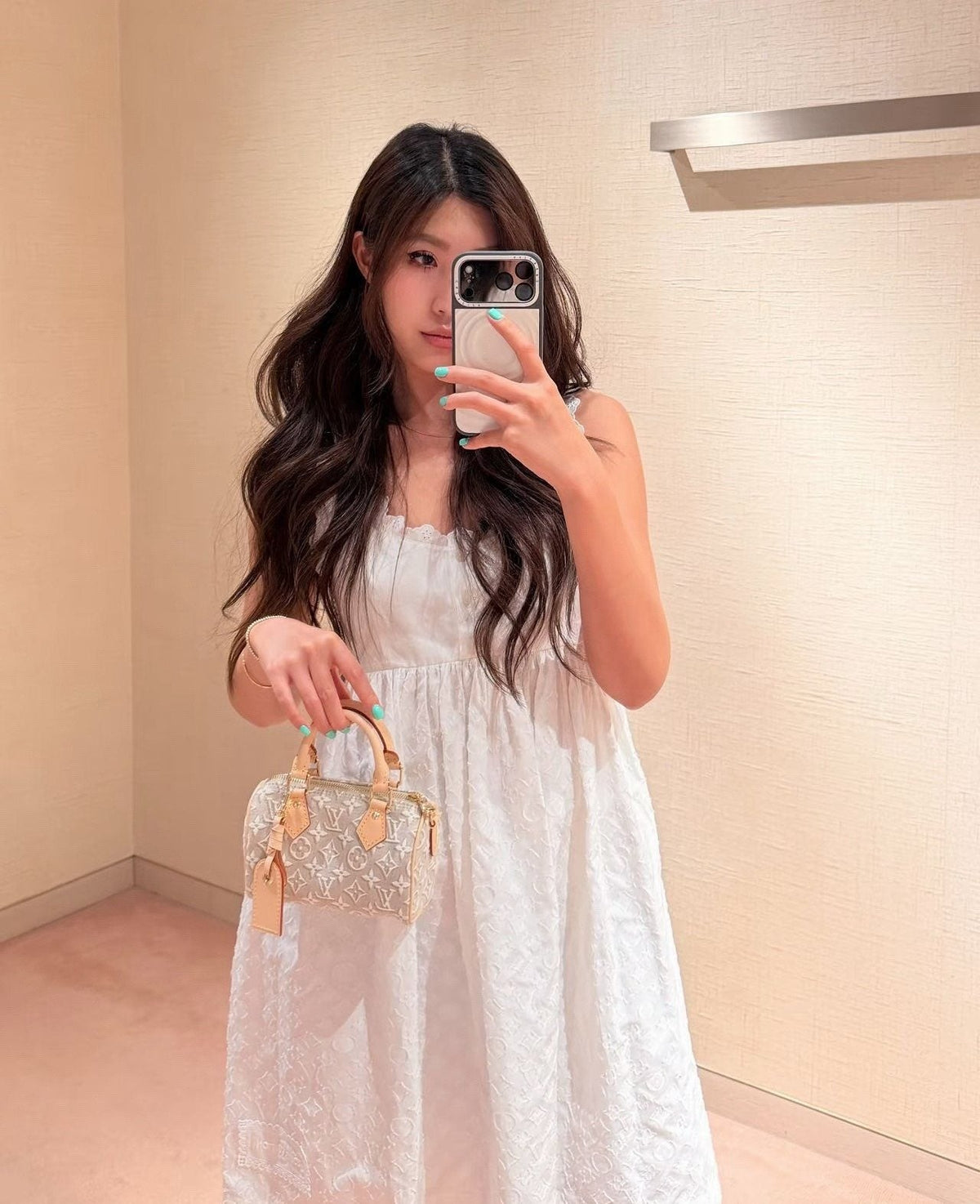 Louis Vuitton Nano Monogram Top-Handle Bag — model