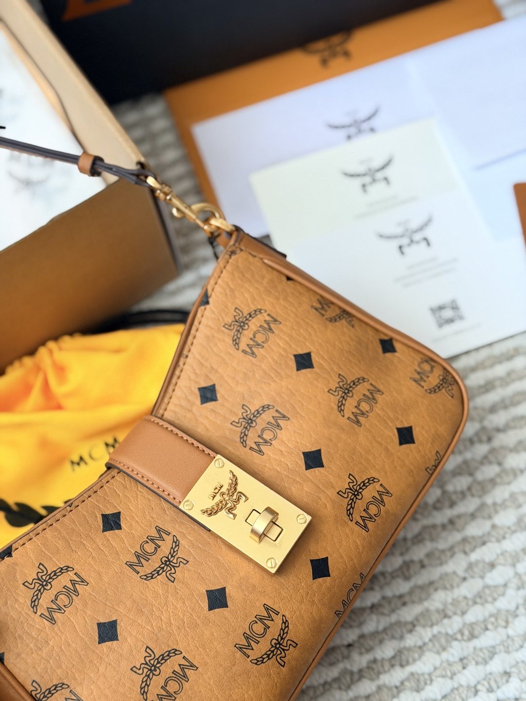 MCM Monogram Hobo Bag with Gold-Tone Clasp — detail