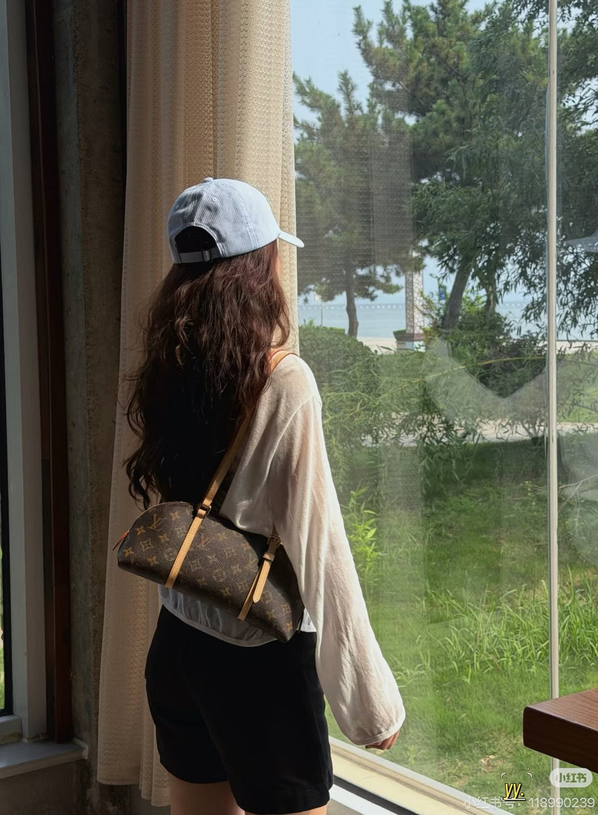Louis Vuitton Squire East West Monogram Shoulder Bag — model