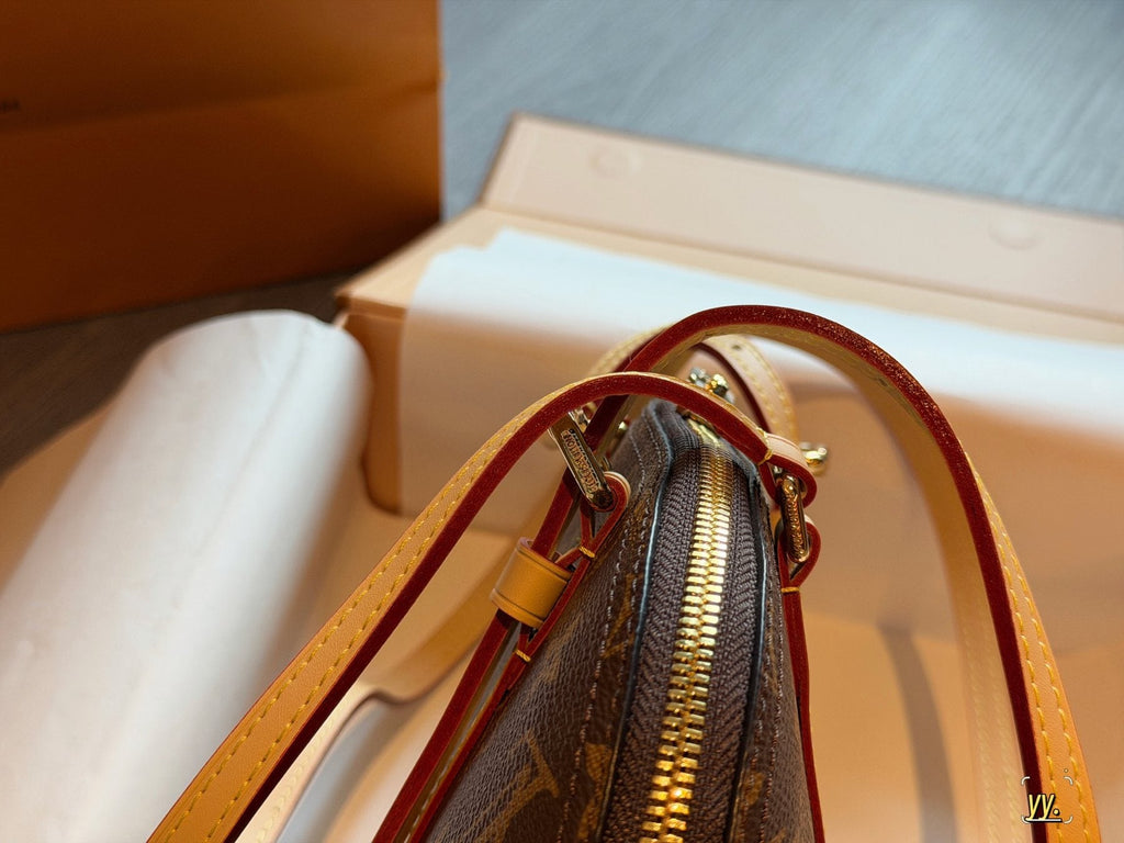 Louis Vuitton Squire East West Monogram Shoulder Bag — detail