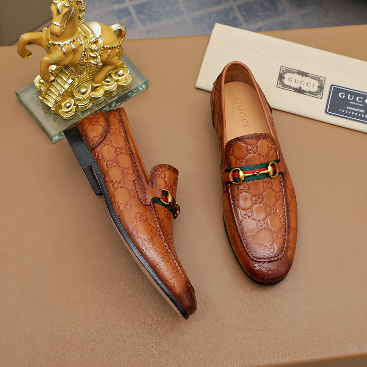 Gucci Patterned Metal-Bit Loafers — front