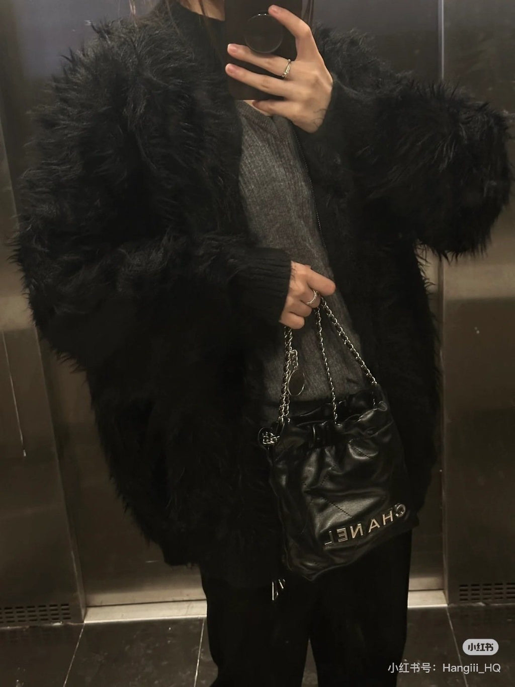 Chanel Mini 22 Quilted Chain Shoulder Bag — model