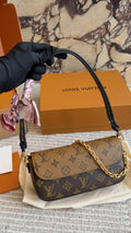 Louis Vuitton Ivy Monogram Wallet on Chain — hero