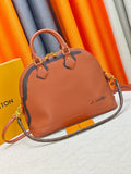Louis Vuitton Alma Soft Cognac Top-Handle Bag — hero