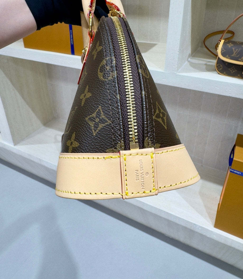 Louis Vuitton Domed Top-Handle Bag — detail