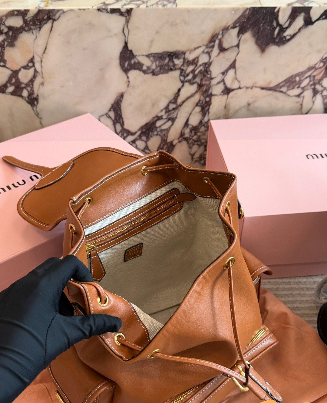 Miu Miu Buckled Flap Backpack — detail