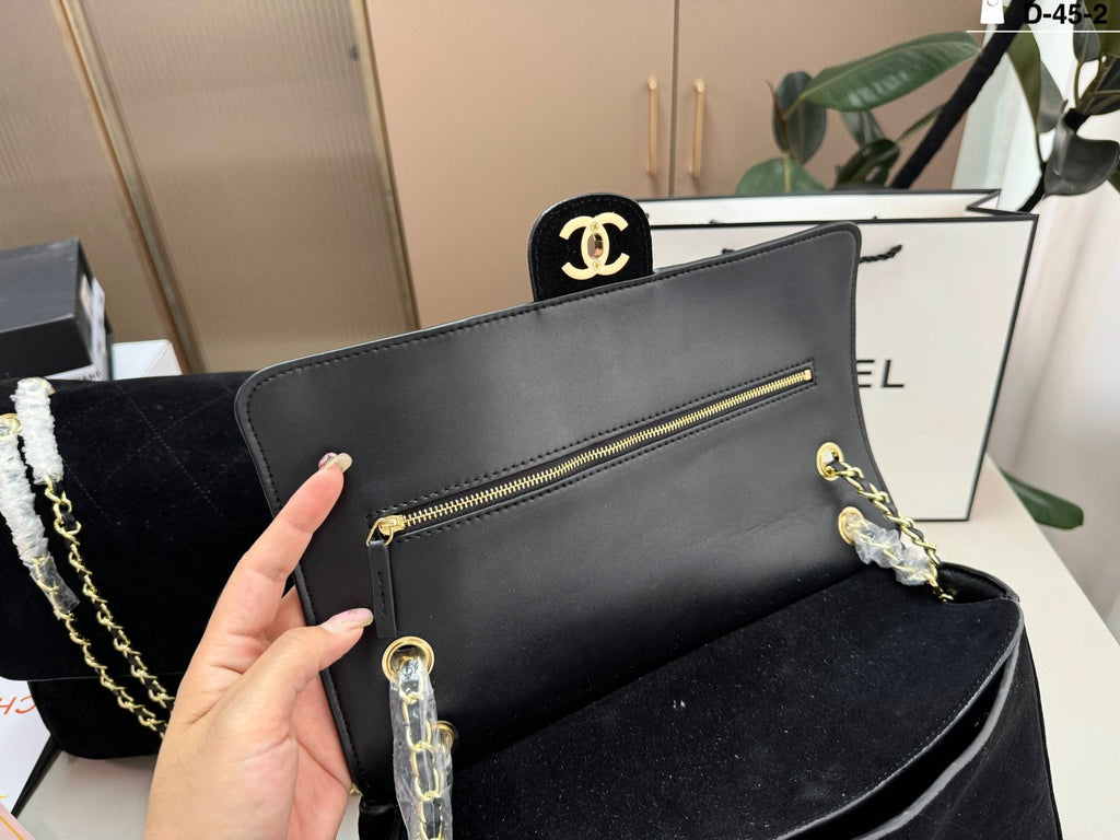 Chanel Maxi Flap Quilted Shoulder Bag — detail